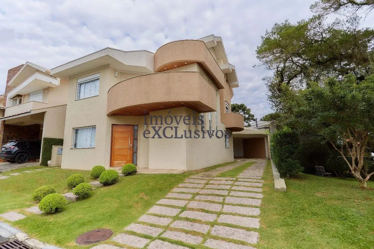 CASA EM CONDOMÍNIO PARA LOCAÇÃO COM 5 SUÍTES E 2 VAGAS
