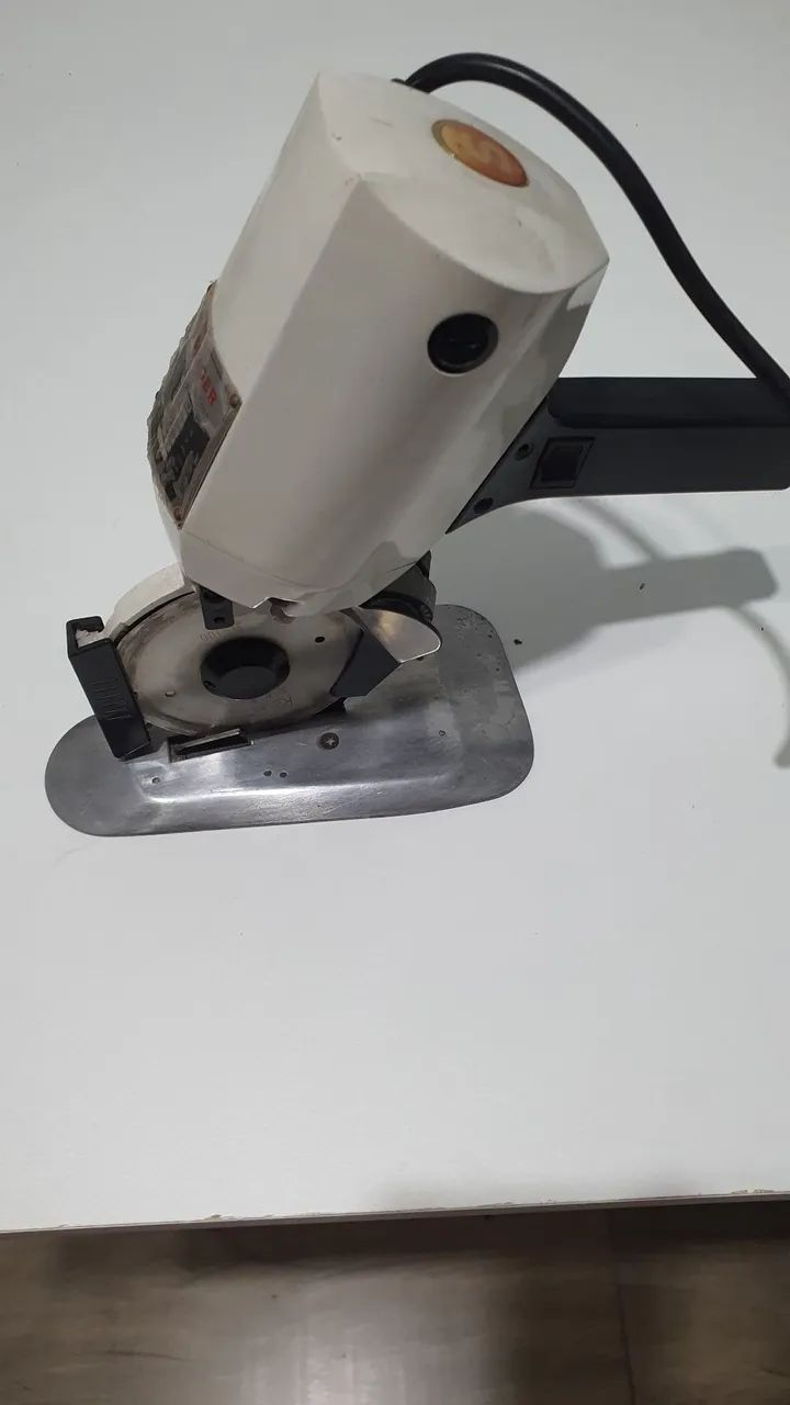 Maquina de cortar tecido Singer  - Foto 5