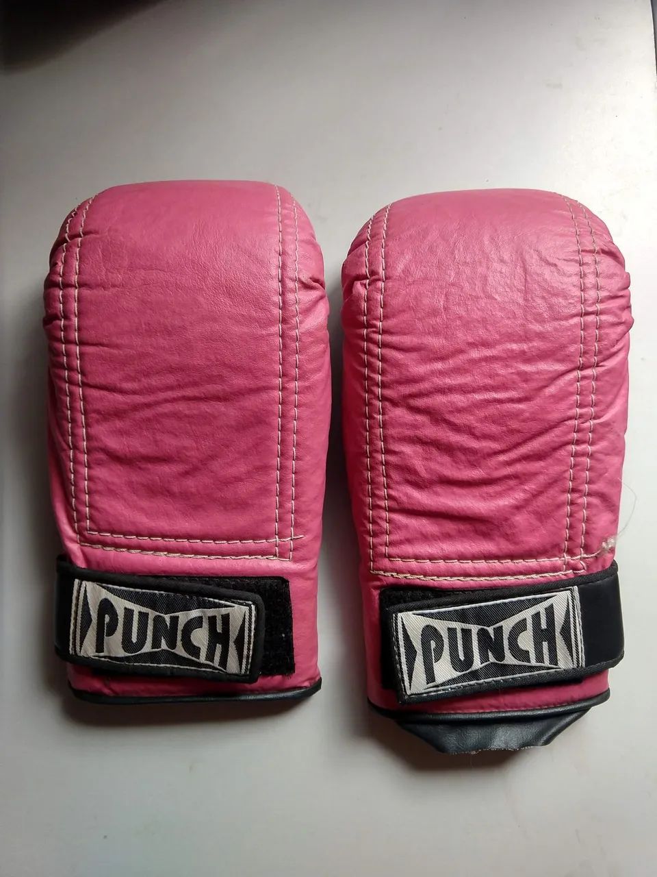 Luvas para muay tai e kickboxe.