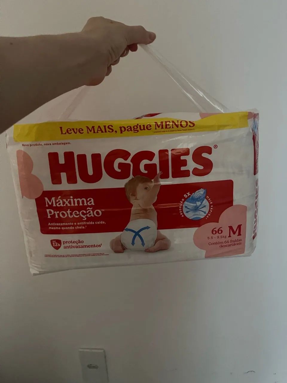 Fralda Huggies M - 66 un 