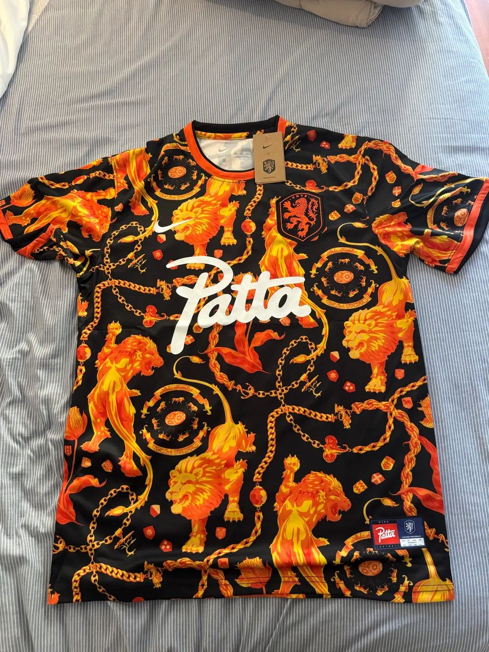 Camisa pré-jogo Holanda Nike x Patta 2026 - Roupas - Barra da