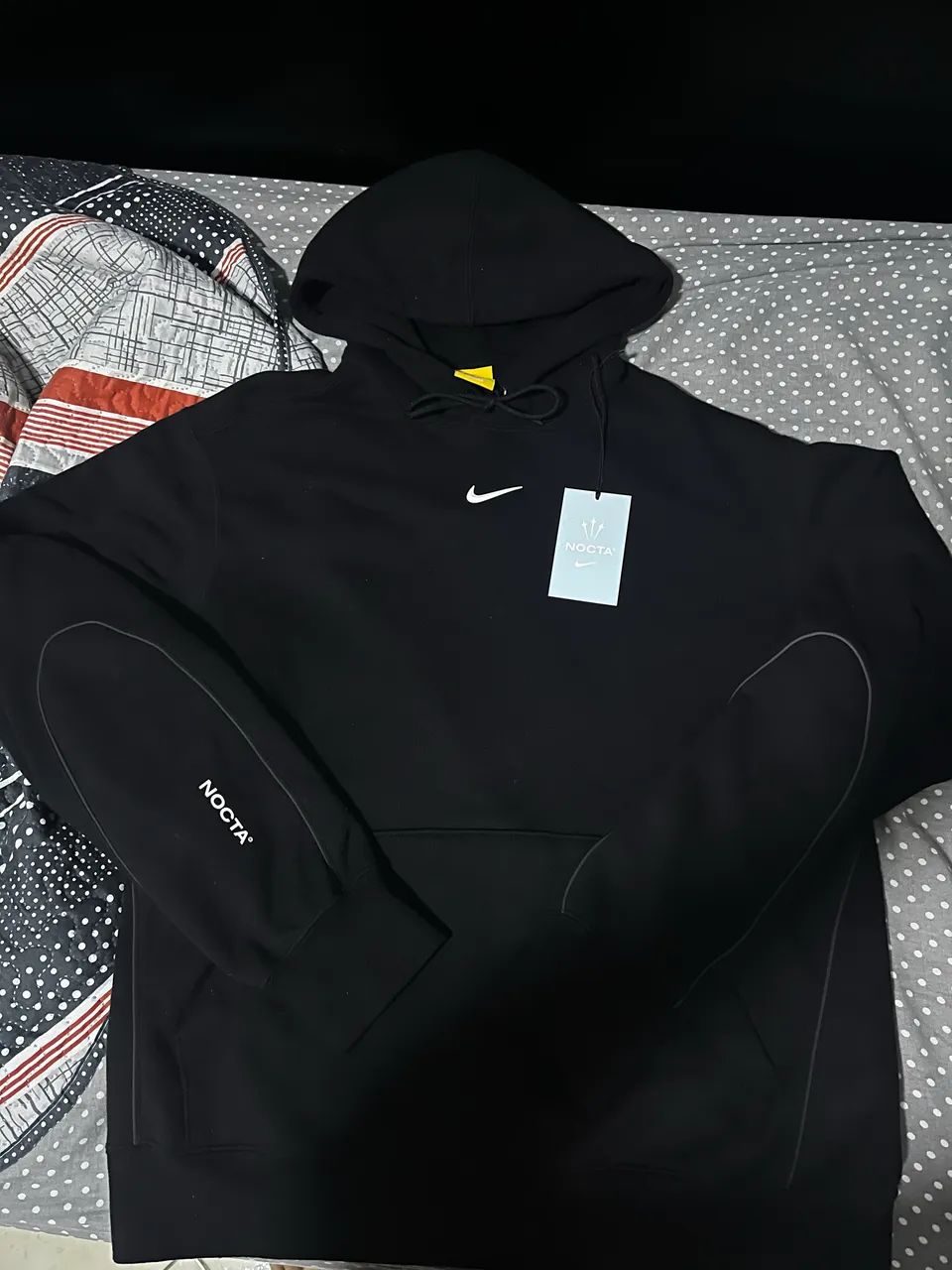 casaco nocta nike