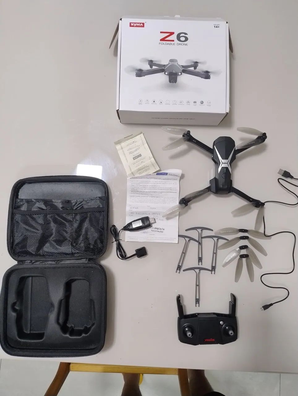 DRONE SYMA Z6 FOLDABLE - NA CAIXA - NUNCA USADO - COM ACESSÓRIOS RESERVA  - Foto 4