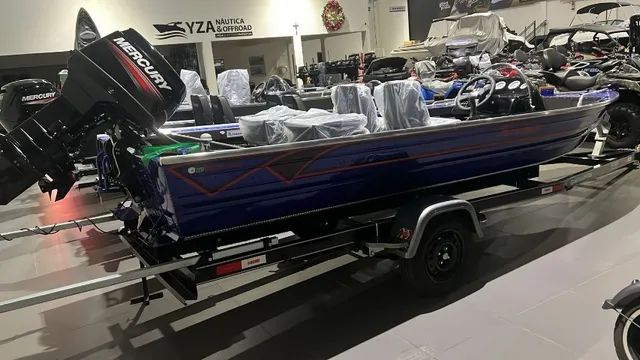 Lancha Fluvimar boto lx plus 5500 + Motor de popa 50 hp Mercury + Carreta rodoviária - Foto 9