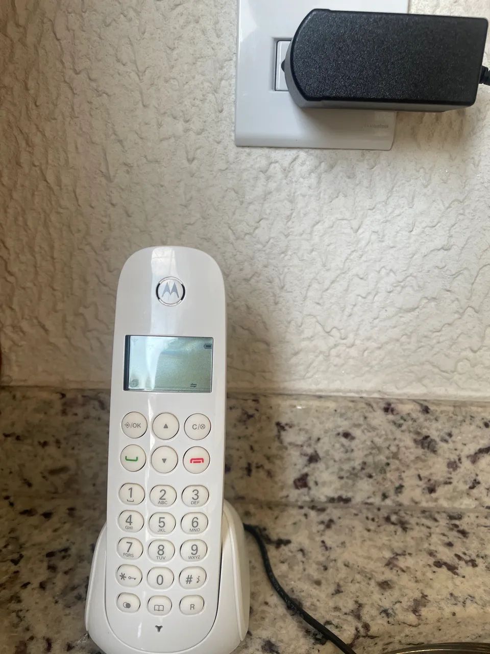 Telefone sem fio Motorola com defeito 