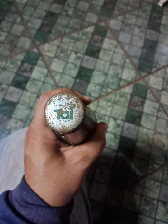 Garrafa + tampinha Guaraná Taí 