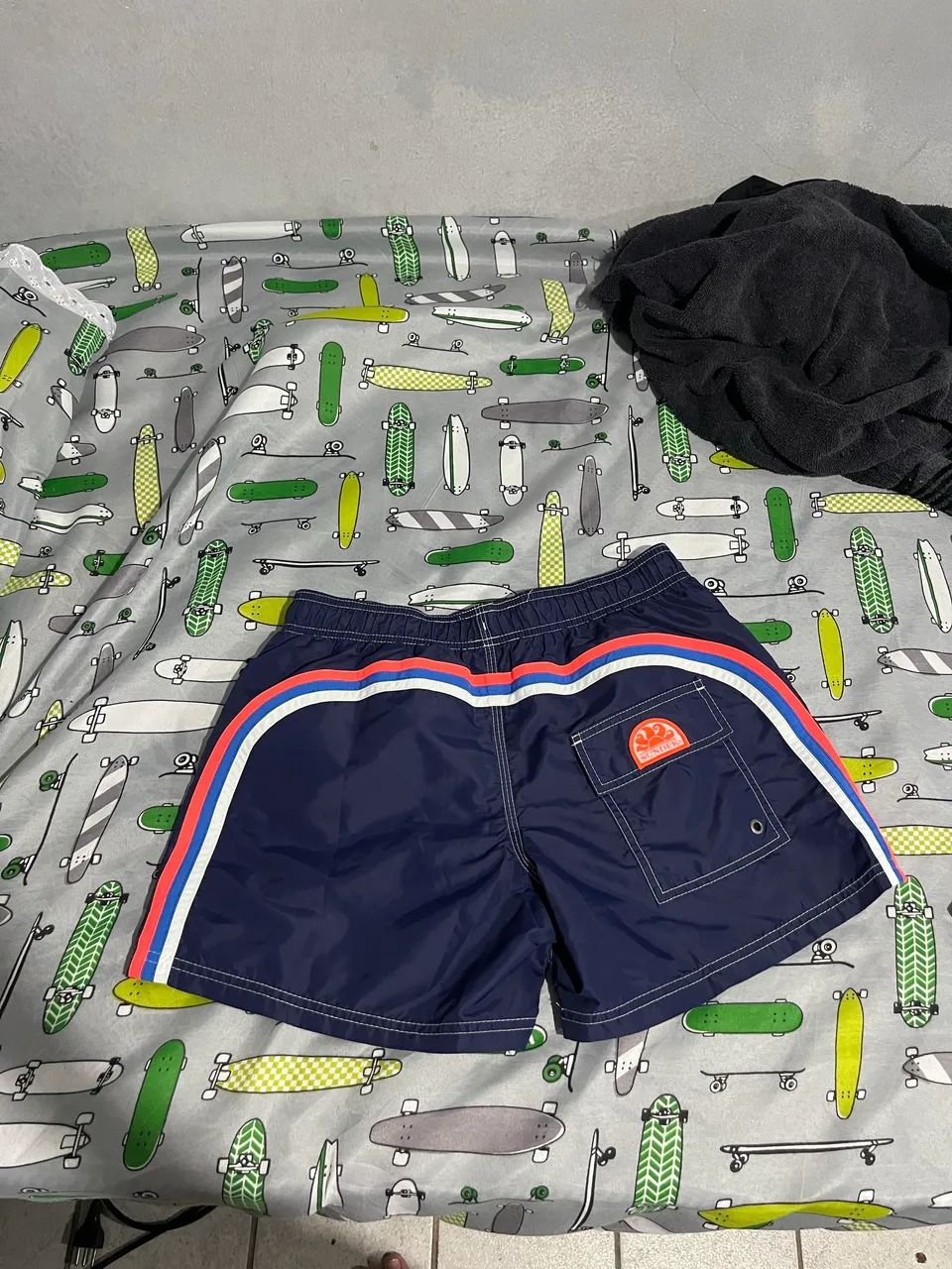 Sundek bolso e elástico 