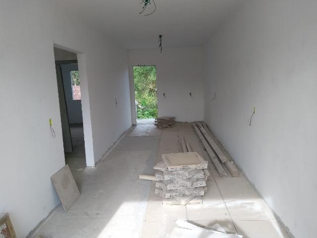 Casa e dois apartamentos em construção - Foto 8