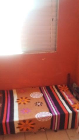 Cama em quarto de republica