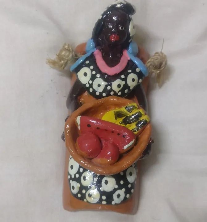 Boneca preta de parede 