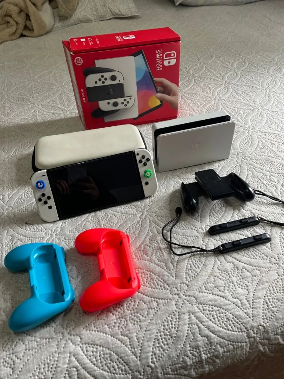 Nintendo Switch OLED + cartão de 128gb = 2 cases de transporte