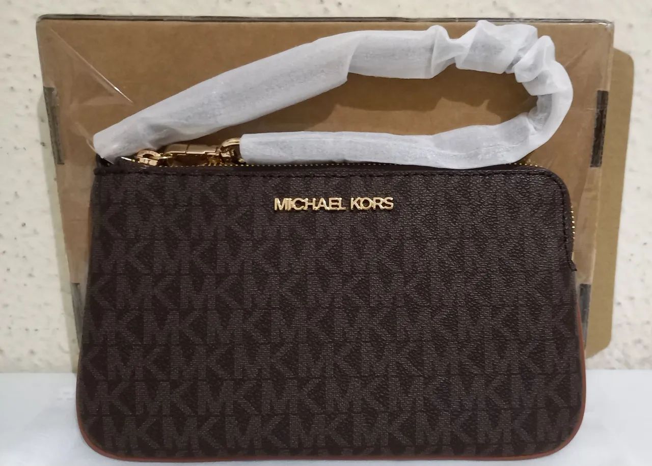 Bolsa michael kors clutch monograma  - Foto 5