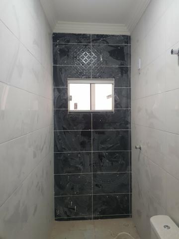 Linda casa com 2/4 sendo uma suite ,banheiro social ,sala ampla . vem conferrir - Foto 7