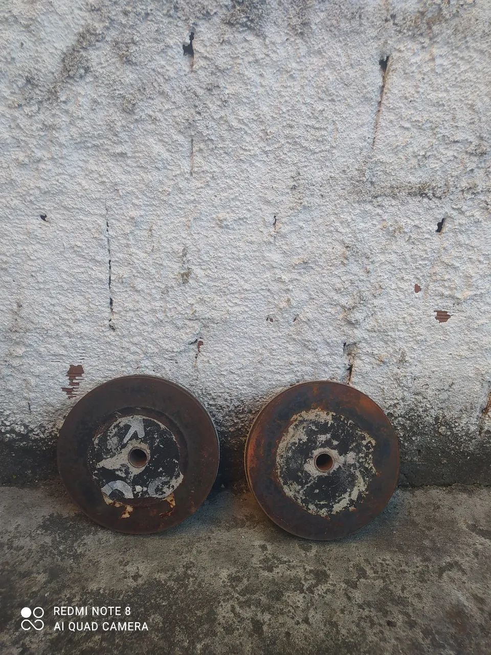 Anilhas caseiras com disco de freio preenchida com concreto 
