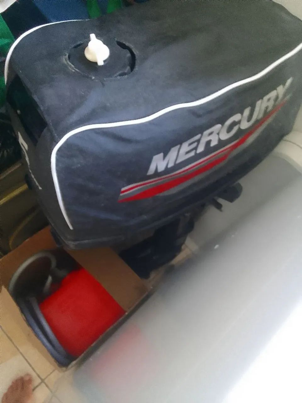Motor de poupa mercury 5 hp super novo so goi na água  5 vezes com noto fiscal e garantia 