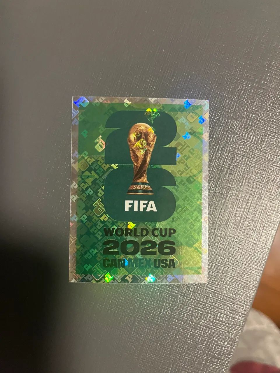 Figurinha FWC 7 (taça verde) 