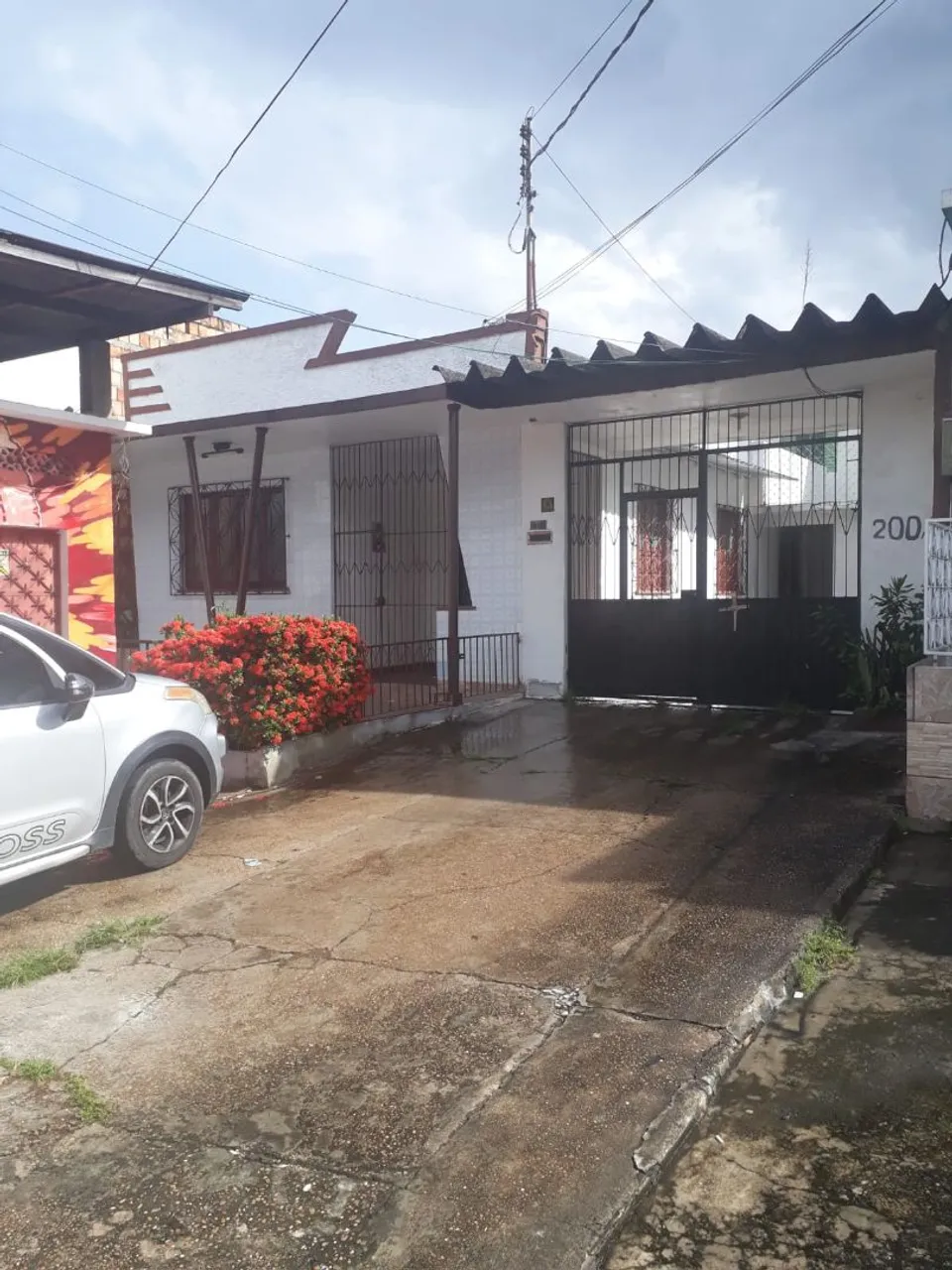 Terreno com 3 casas e 1 ponto comercial