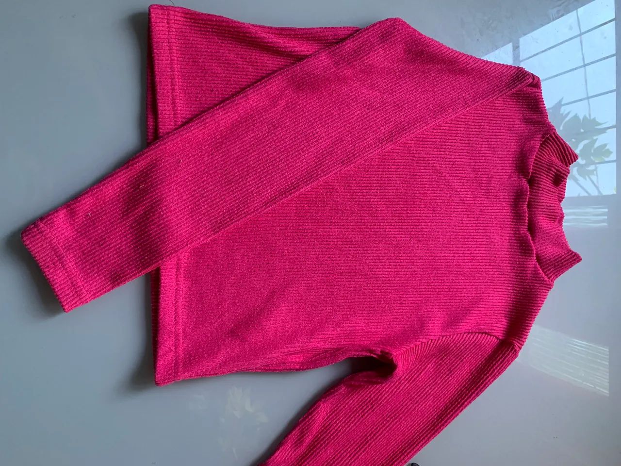 Blusa rosa de mangas longas 