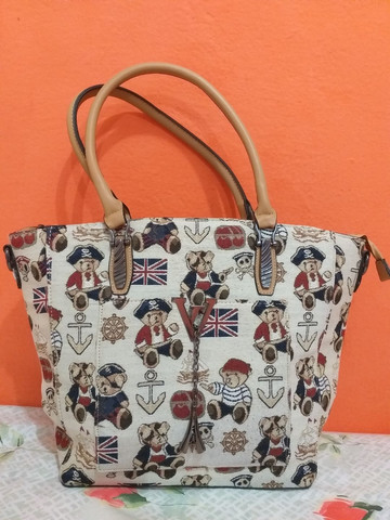 Bolsa estampada de alça 