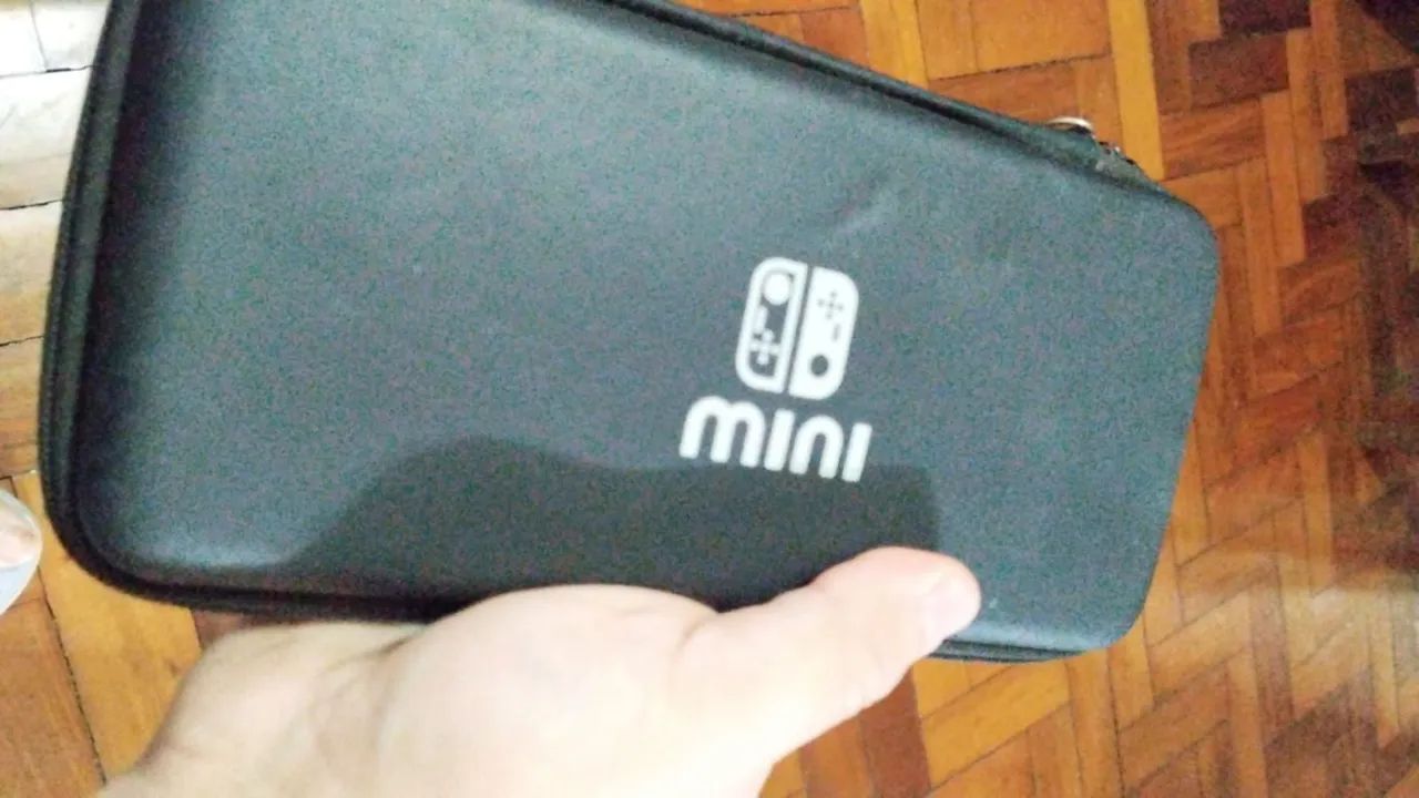 Switch lite Desbloqueado + cartão sd 128gb - Foto 3
