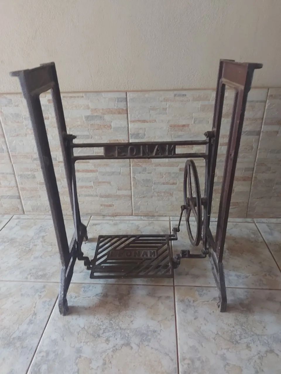 Pé de máquina de costura