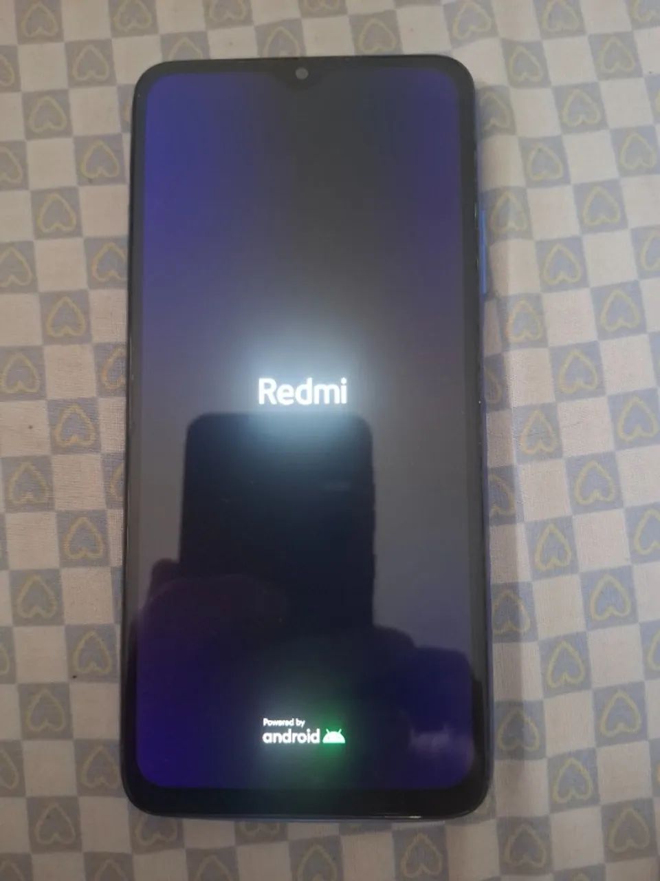 Celular Redmi 9T Azul, funcionando perfeitamente