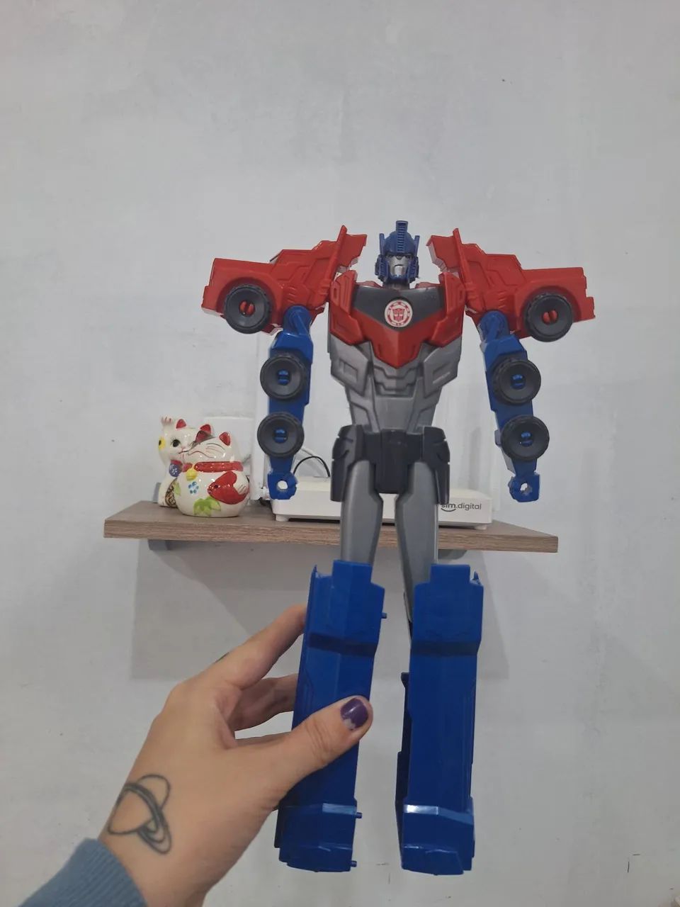 Boneco Robô e caminhão Transformers 2 em 1
