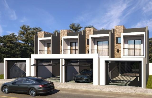Lindro sobrado no Saguaçú com amplo terreno