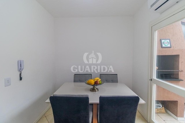 Casa em Condomínio para comprar no bairro Guarujá - Porto Alegre com 3 quartos - Foto 3