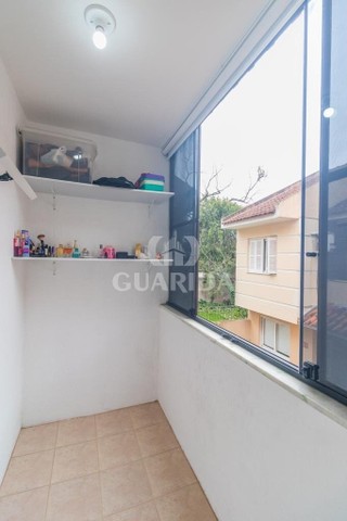 Casa em Condomínio para comprar no bairro Guarujá - Porto Alegre com 3 quartos - Foto 15