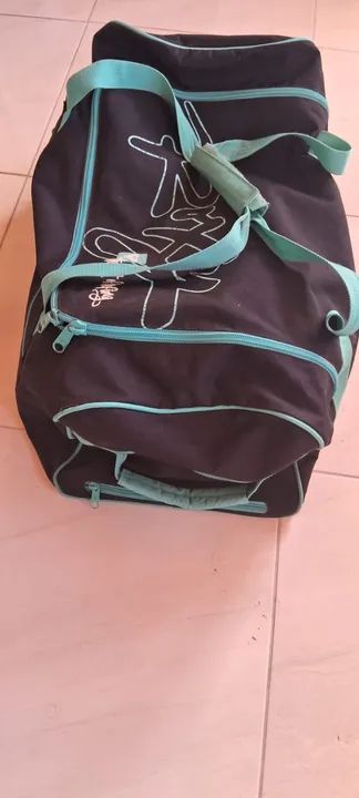 Vendo Bolsa com rodinha pra viagem de marca roxy original! Oferta!
