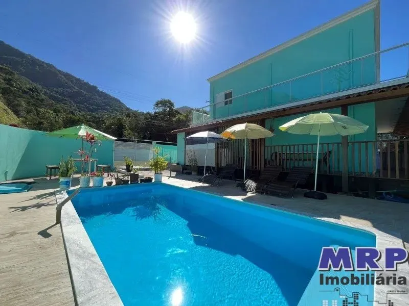 Casa à venda em Ubatuba, Praia da Lagoinha. 4 dormitórios. Com piscina. Aceita financiamen