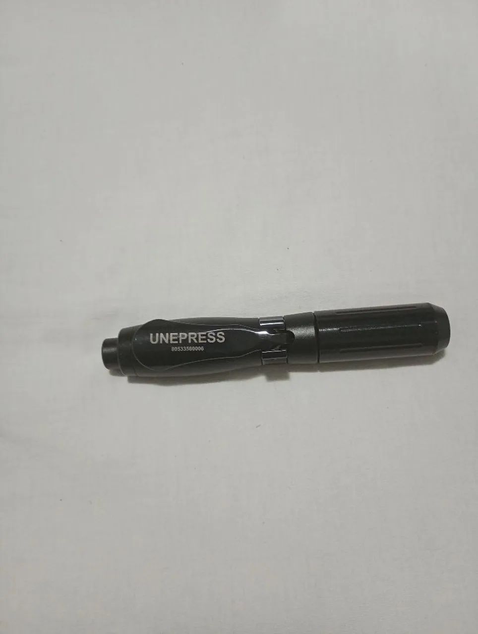 Caneta pressurizada unepress preta com Anvisa 