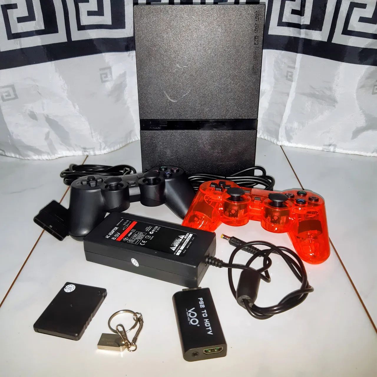 PS2 Slim com 2 controles, 24 jogos e leitor funcionando