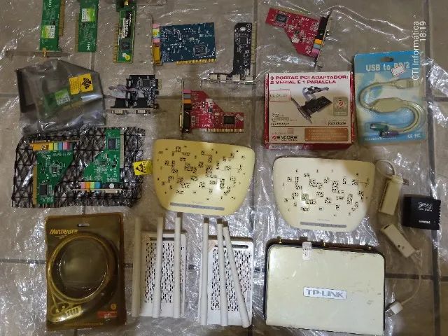 Lot of Various Computer Items (Routers Modem Sound Cards Print Server)64317905636354120