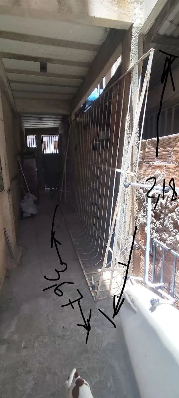 grade de ferro tapa ladrão .