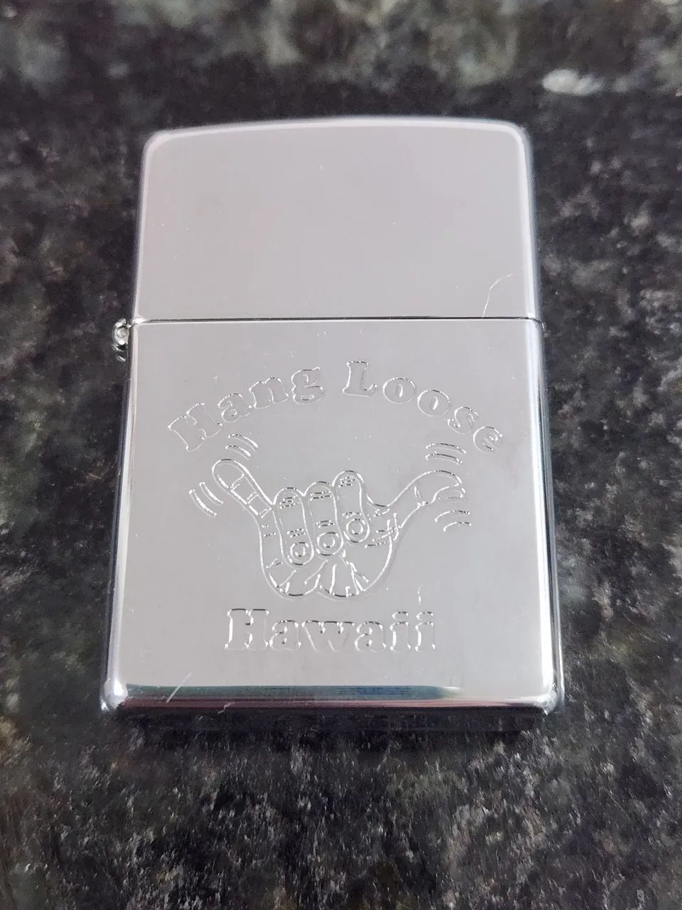 Isqueiro zippo hang loose 