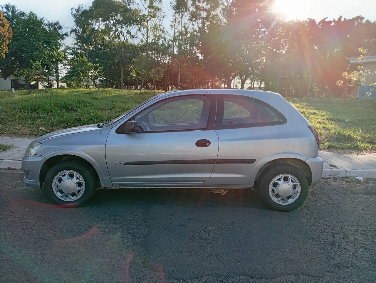 Flex celta 2012, econômico,bom estado,troco moto carro , leia 