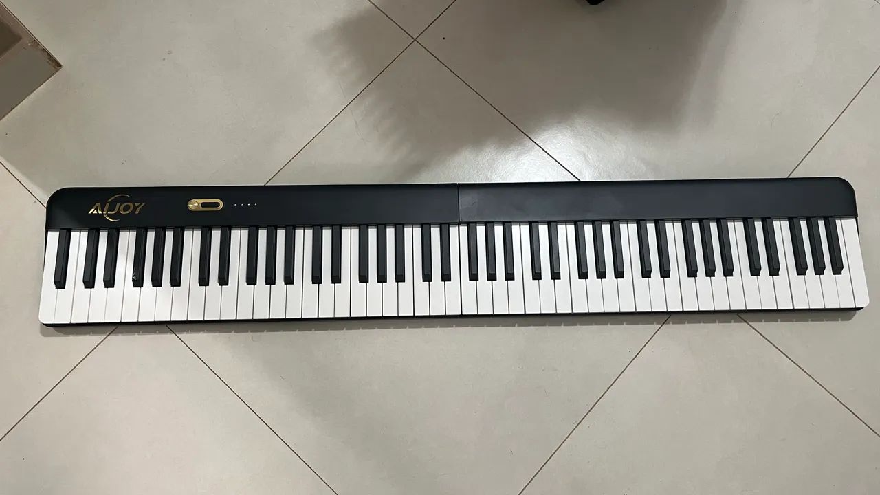 Piano eletrônico portátil 