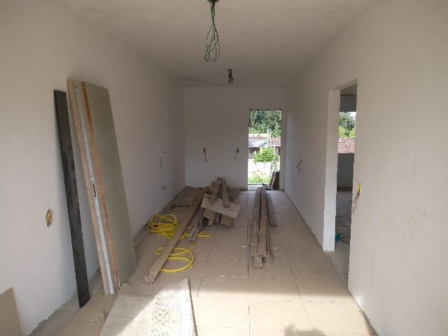 Casa e dois apartamentos em construção - Foto 9