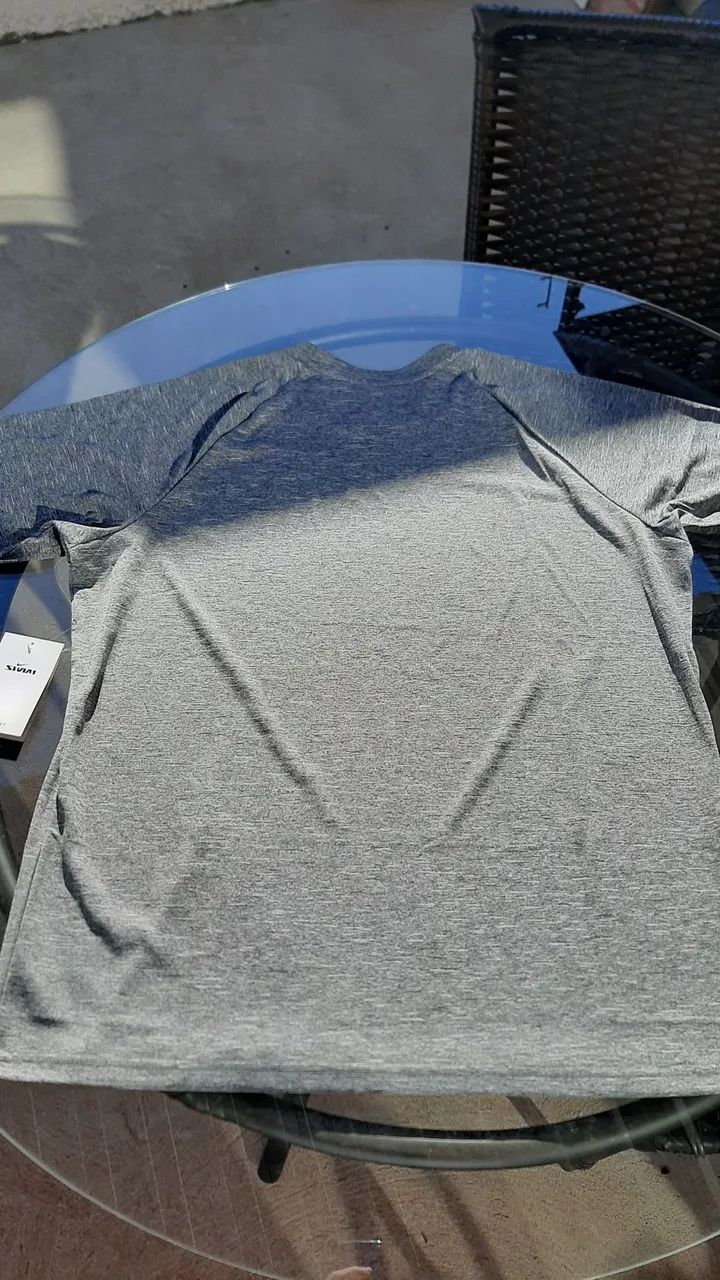 Camiseta Nike Dri-FIT Swim Masculina - Foto 2