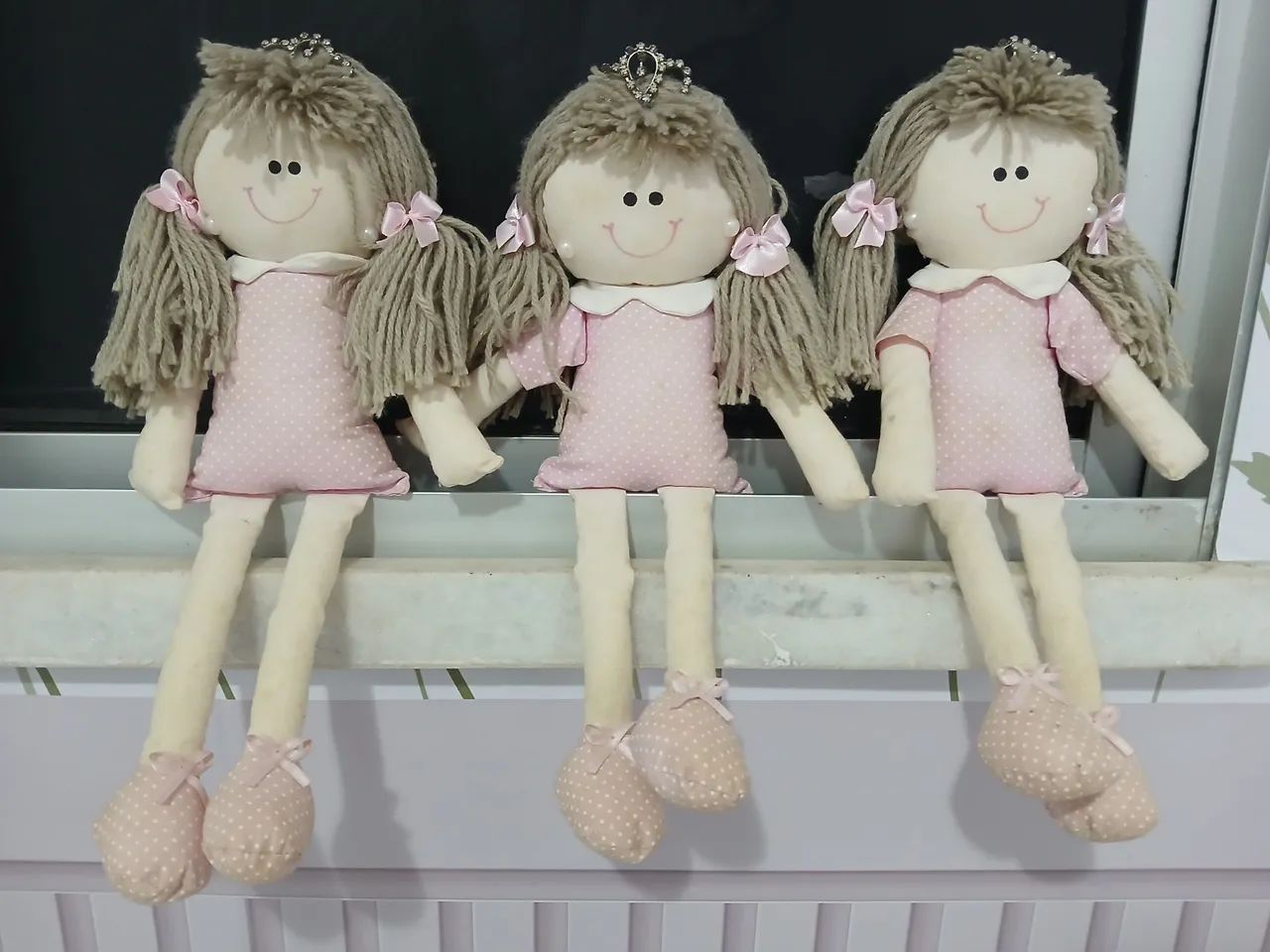 Trio de bonecas de pano