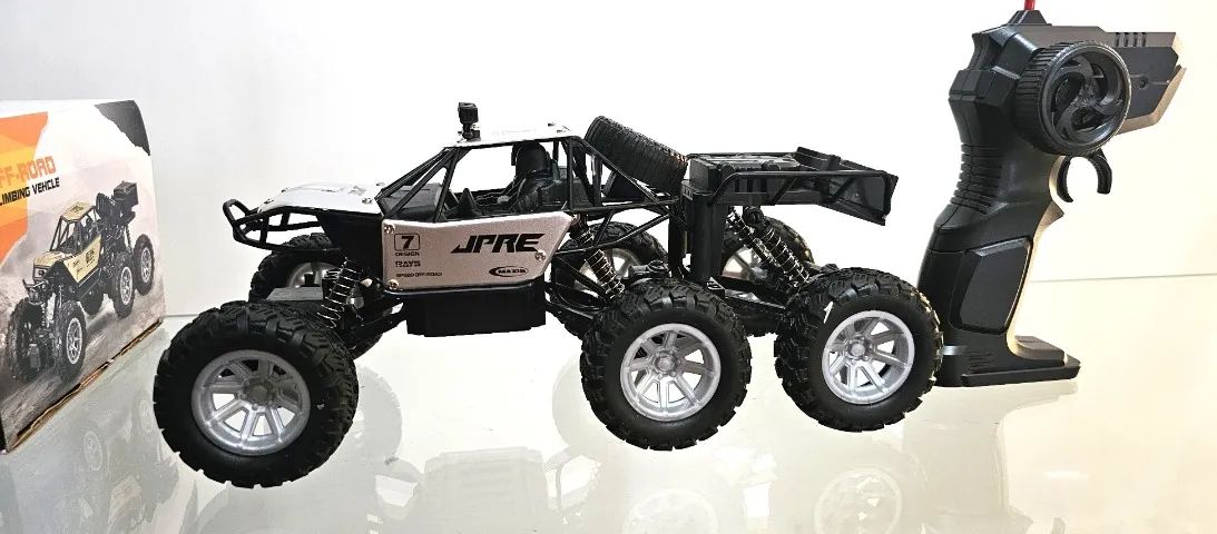 Carrinho de Controle Remoto a Bateria Recarregável 3 Eixos Tipo Jeep 4x4 - Foto 6