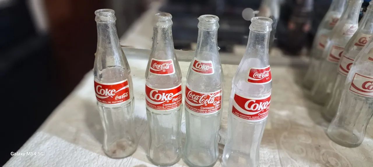 Garrafas de Coca-Cola antigas valor unitario 