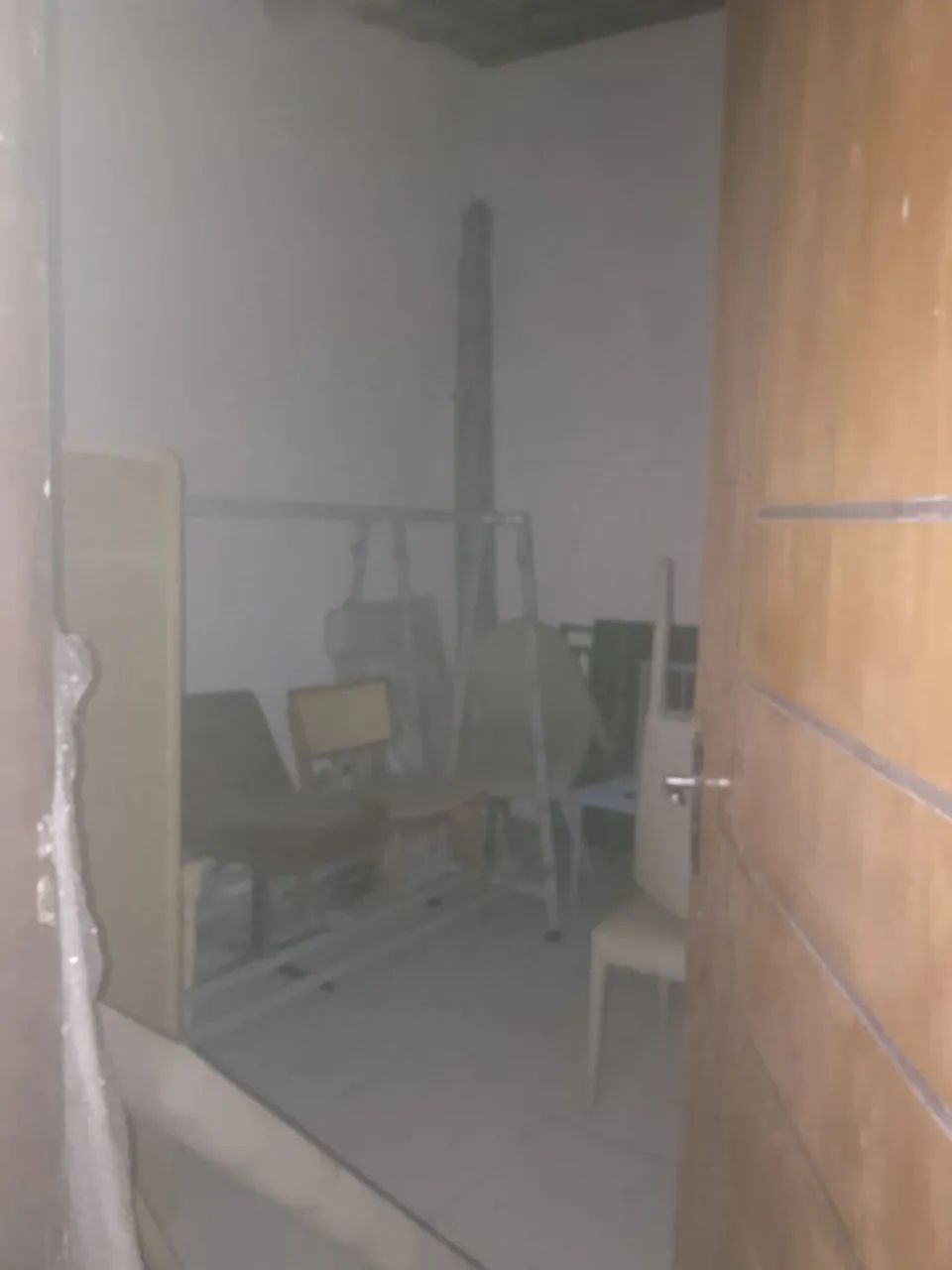 Vendo casa terreno com outras casas 
