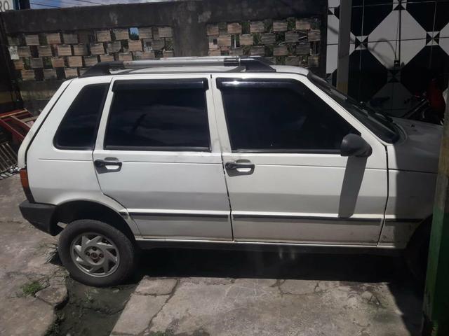Vendo fiat uno 4 portas selado 203/204