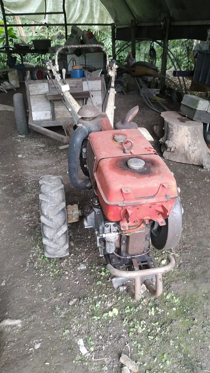 Yanmar TC11 com carreta e rotativa 
