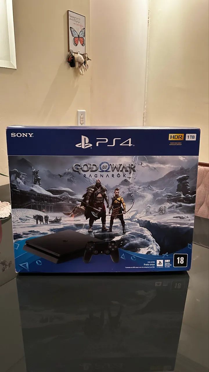 Vendo PS4 (1TB) com 9 jogo (God of War ragnarok)lacrado - Foto 2