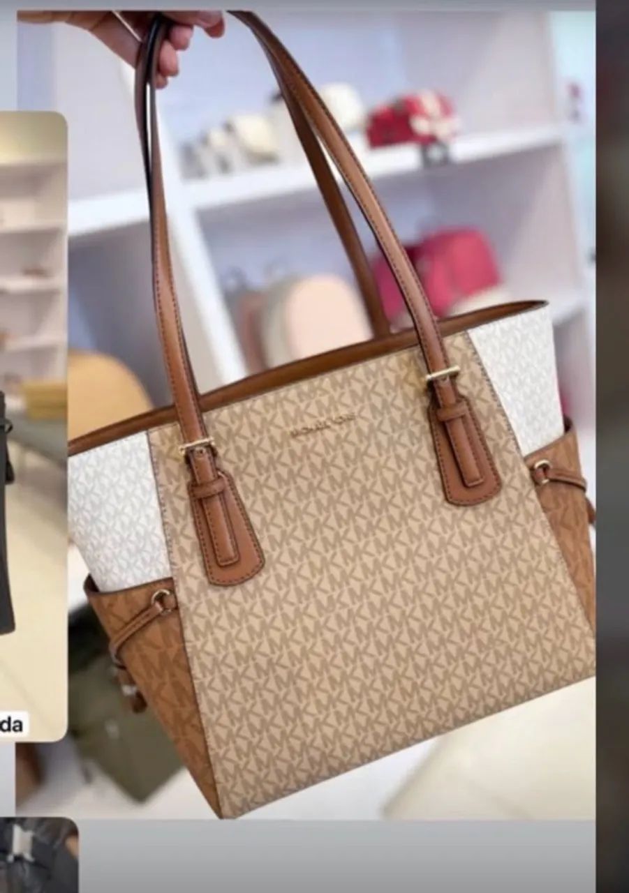 Bolsa Michael kors nova  grande cabe um notebook dentro 