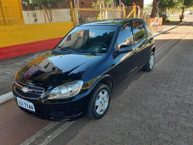 Vendo celta lt 1.0 4 Portas com air bag ABS completo super inteiro - Foto 2